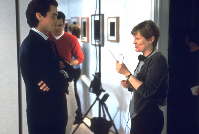 Christian Bale and director Mary Harron talk on the set of American Psycho