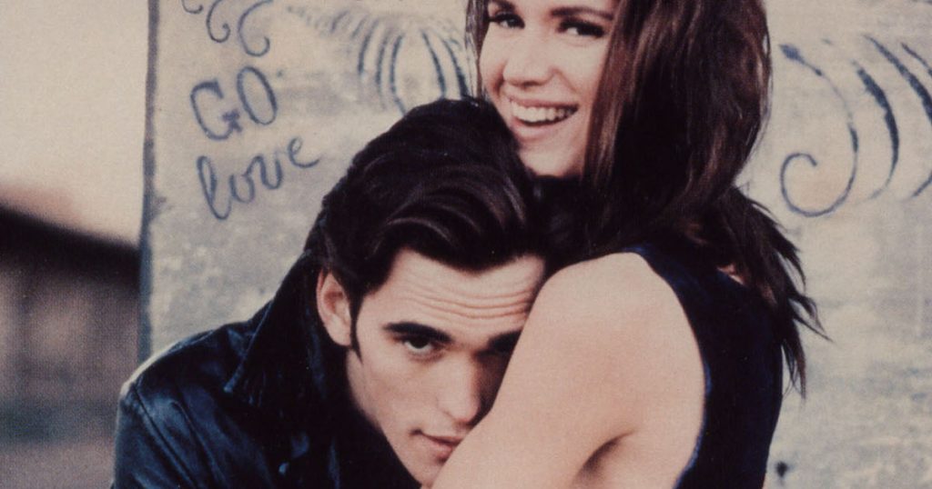 A smiling Kelly Lynch hugs Matt Dillon in the poster art from Drugstore Cowboy