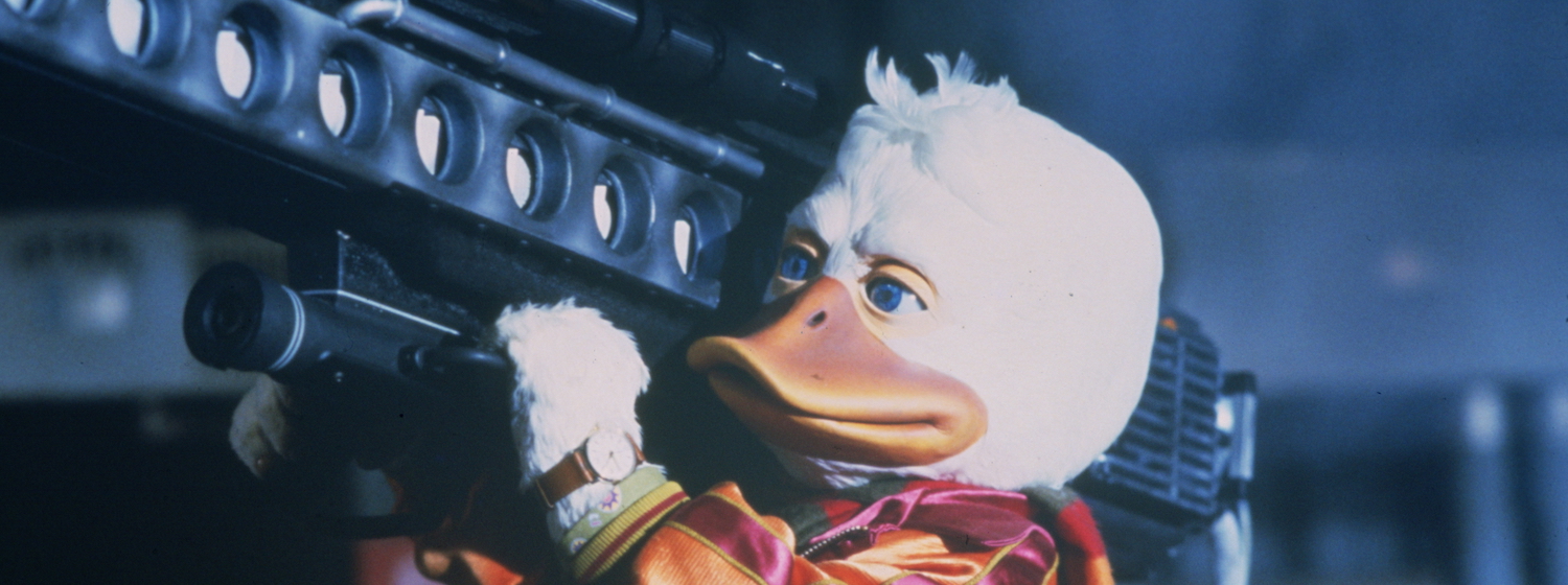 Howard the Duck wields a large gun in 1986's Howard the Duck