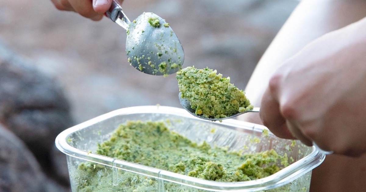 Using two spoons to form falafel quenelles