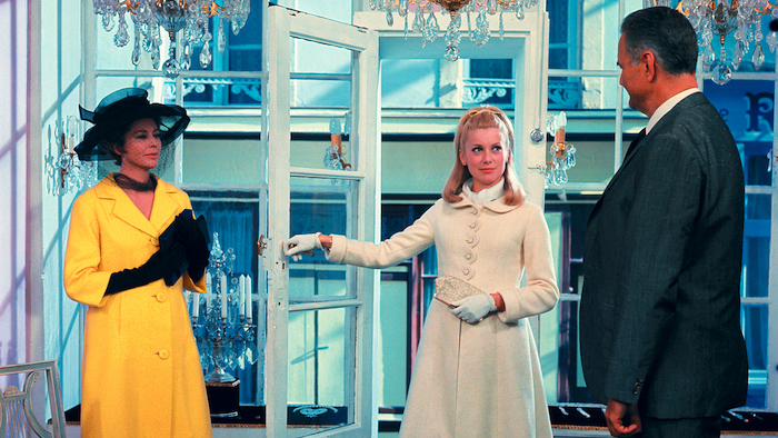 Catherine DENEUVE and Anne VERNON in The Umbrellas of CHERBOURG