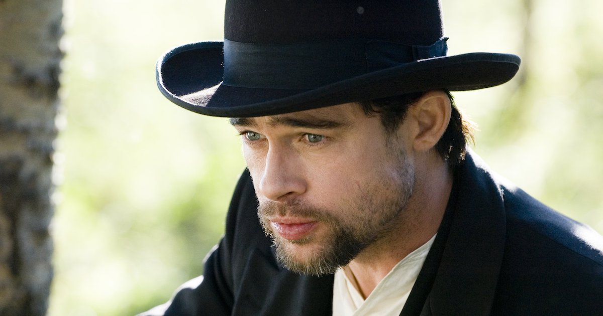 Close up of Brad Pitt with a beard, wearing in a period hat in The Assassination of Jesse James by the Coward Robert Ford 