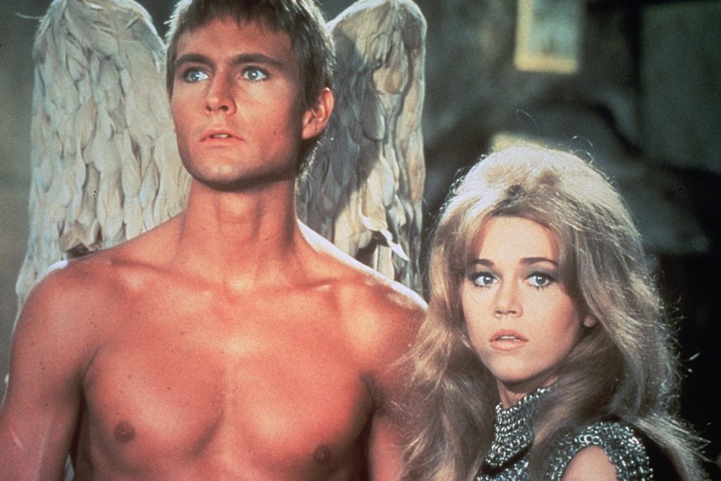 Jane Fonda as Barbarella stands with Pygar the Angel (John Phillip Law)