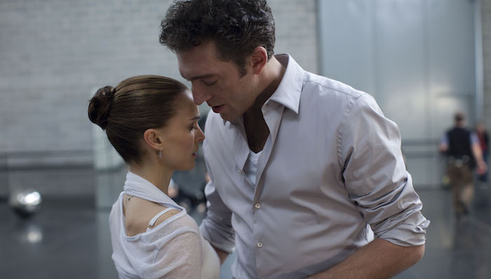 Vincent Cassel, as the ballet director, looms over Natalie Portman in a rehearsal scene in Black Swan