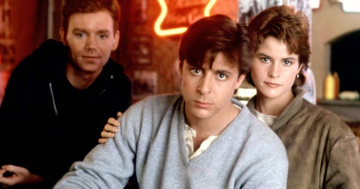 Judd Nelson, Ally Sheedy, and David Caruso pose for a photo in a bar in a promotional image for the film Blue City
