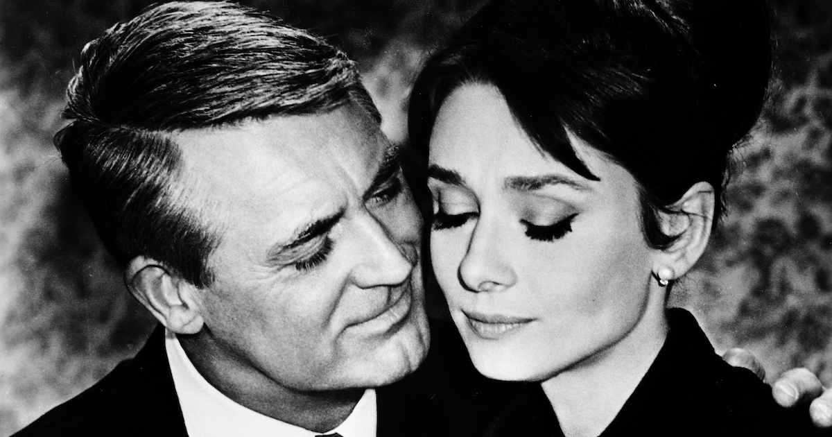 close up of Gary Grant and Audrey Hepburn in Charade