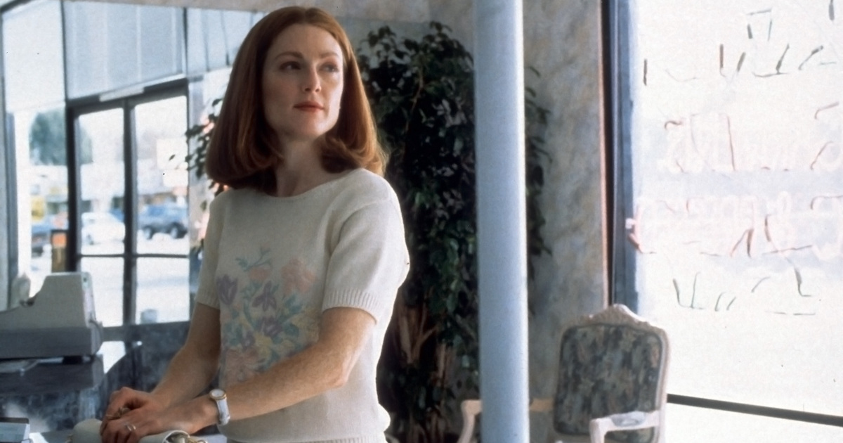 Julianne Moore stands at a shop counter in Safe