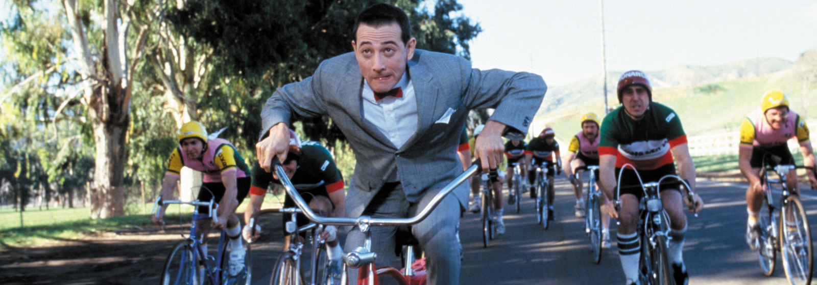 Paul Reubens as Pee-Wee Herman joins a cycle road race in Pee-Wee's Big Adventure