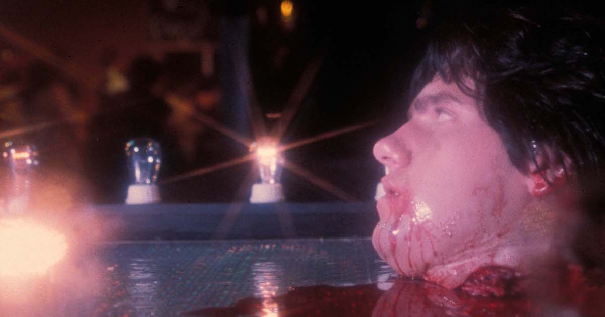 the severed head of a young man with dark hair sits on a light-up dance floor in Prom Night