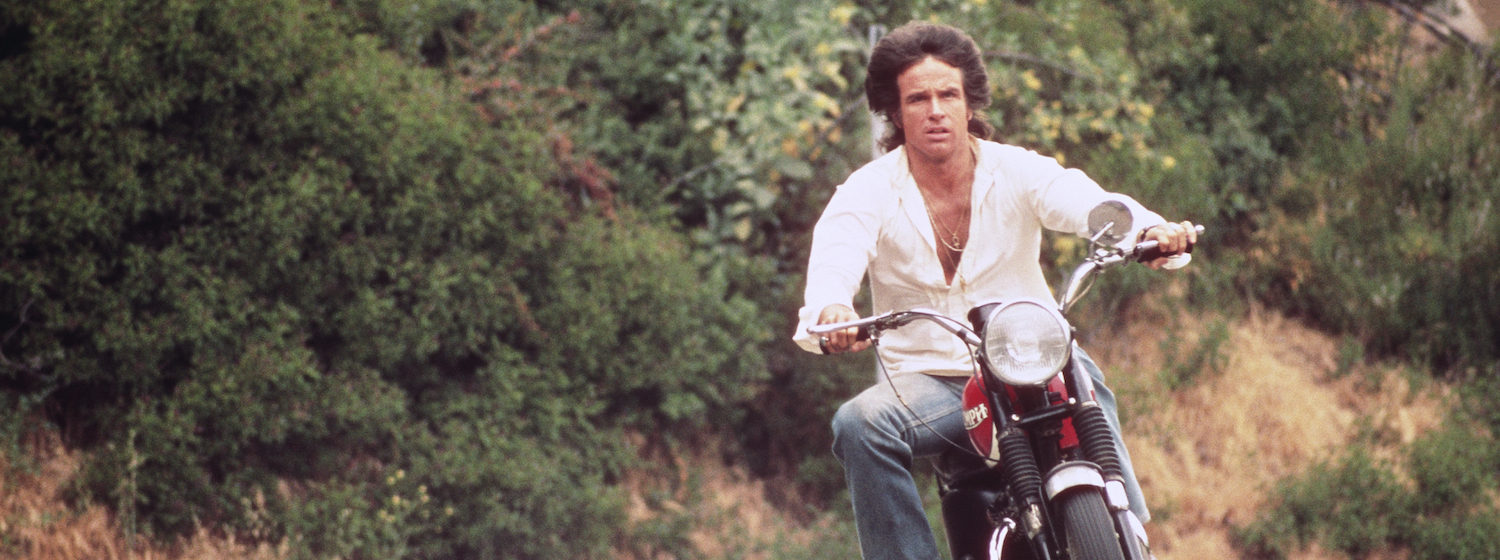 Warren Beatty rides a motorcycle in Shampoo