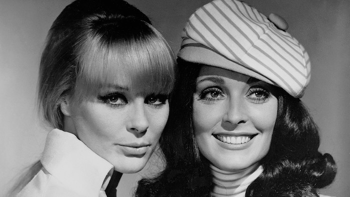 Elke Sommer and Sharon Tate pose for a black and white publicity photo for The Wrecking Crew (1968)